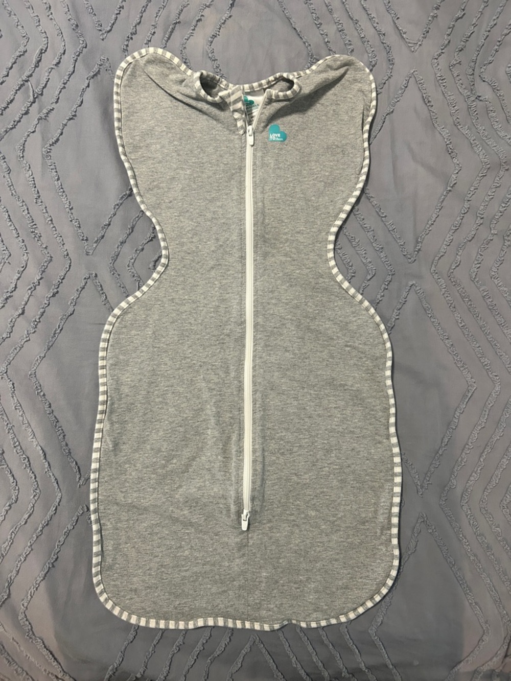 Love to dream Gray swaddle up sleep sack.